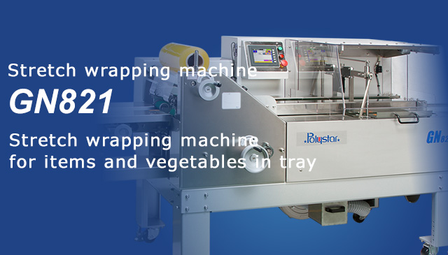 Stretch wrapping machine for items and vegetables in tray